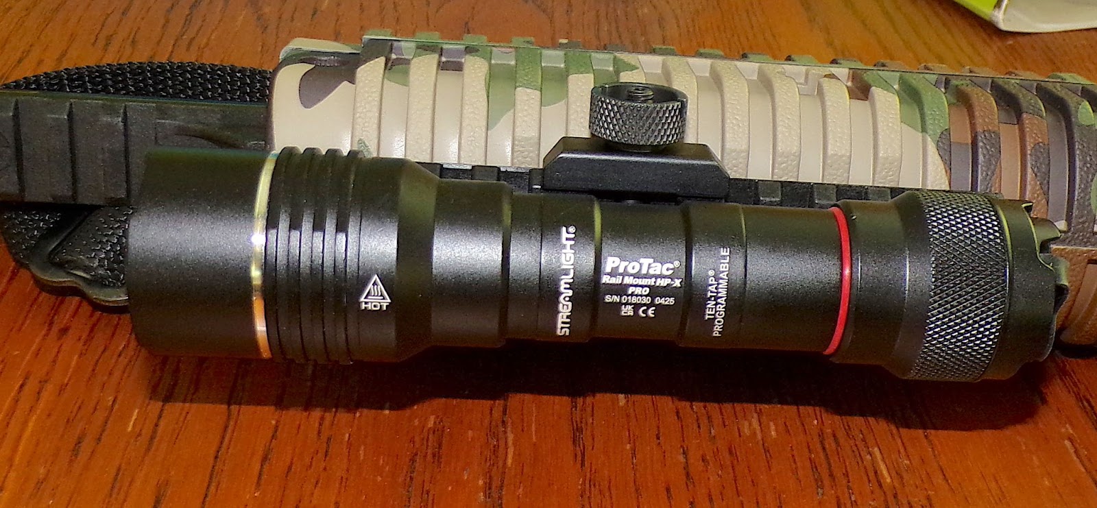 A Protac Rail Mount HP-X Pro USB light, and a Megastream USB High Output flashlight.